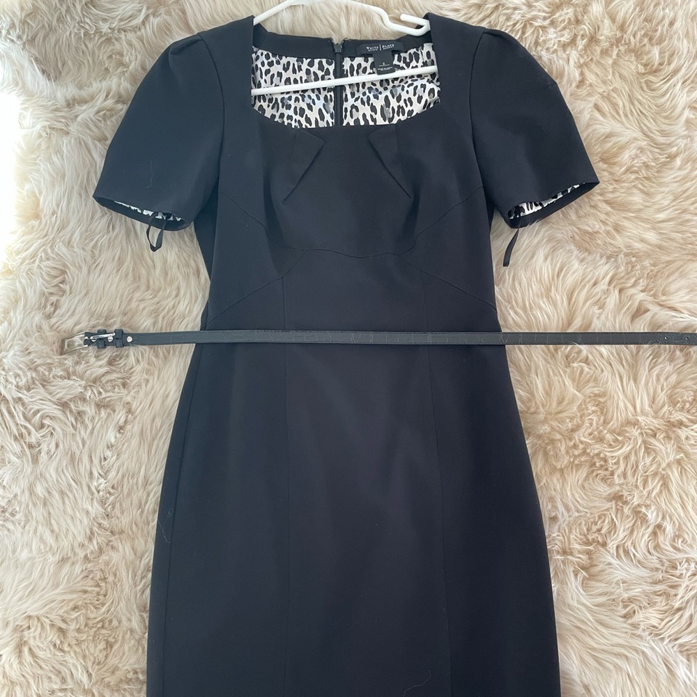 Black dress with square neckline